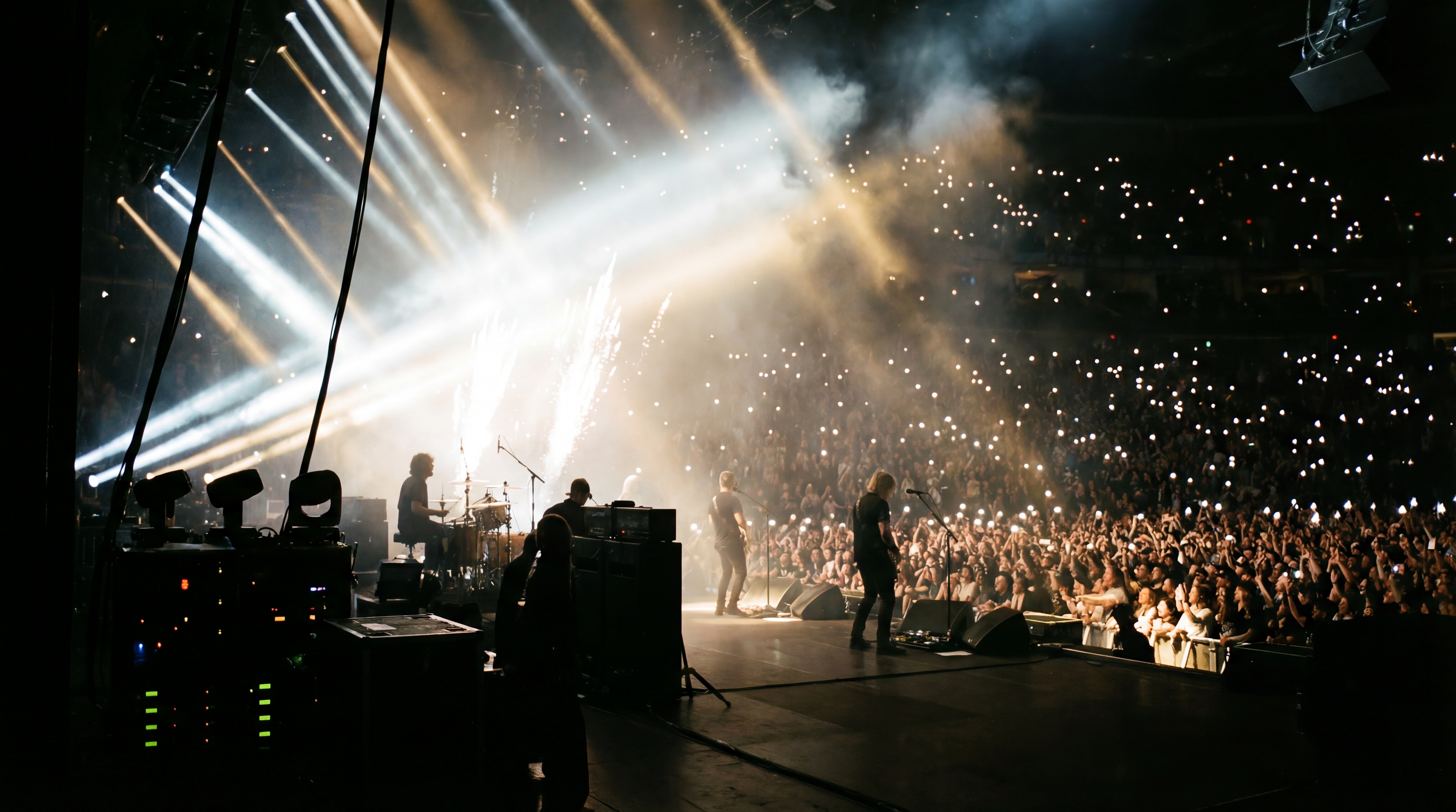 Concert crowd with hands raised